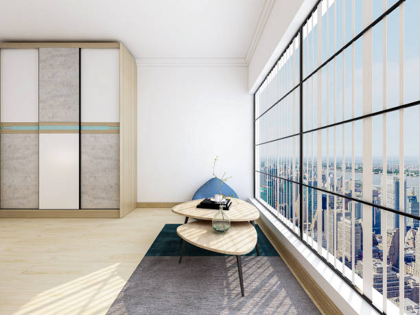 istock 3D rendering, elegant and modern bedroom design, big bed with overcoat cabinet, and coffee table, etc., the sun sprinkled from the floor window, very comfortable and leisure. 1209233847