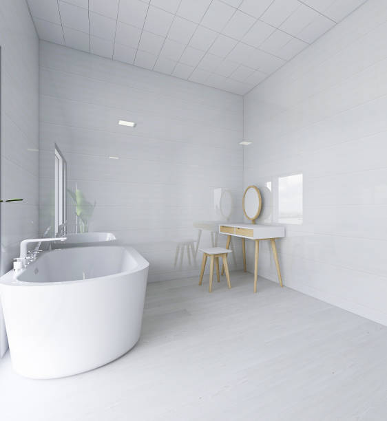 istock 3D rendering, clean modern residential bathroom and toilet design, which is equipped with washstand, toilet, bathtub, dressing table, shower equipment and green plants. 1209239392