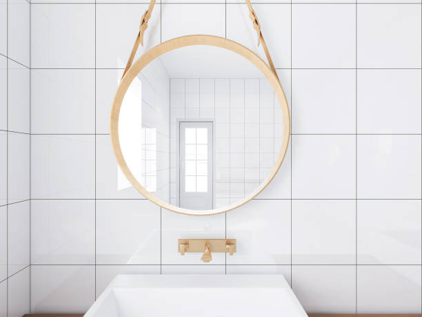 istock 3D rendering, clean modern residential bathroom and toilet design, which is equipped with washstand, toilet, bathtub, dressing table, shower equipment and green plants. 1209239502