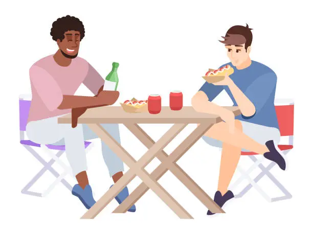 Vector illustration of Two men eat and chat at table flat vector illustration. Guys with hot dogs and soft drinks, folding furniture. Couple of friends at city picnic isolated cartoon characters on white background