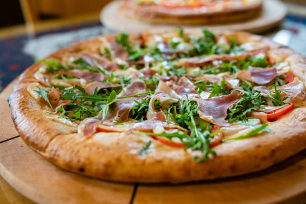istock A delicious pizza on the table 1209242450
