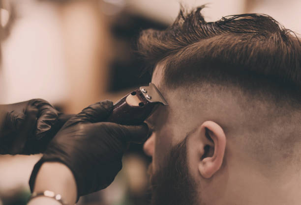 istock bearded man in barber shop 1209243732