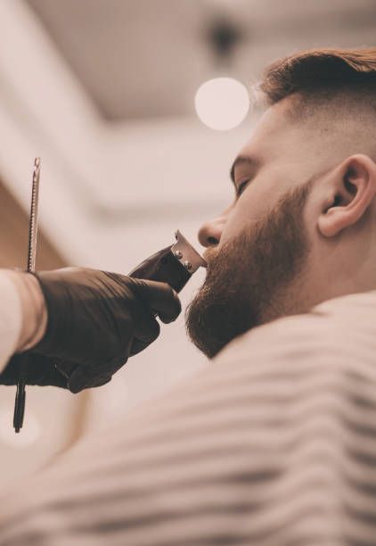istock man visits a barbershop 1209243863