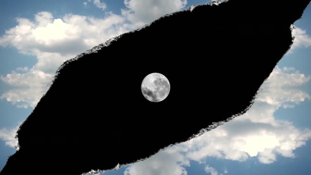 Creative 4k time laps video hole in the sky with moving clouds with torn edges, like on paper, and moving into the camera in this hole from the darkness of space full of luminous moon. A hole in space.
