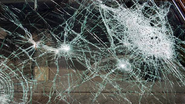 Windshield with multiple points creating shattering stock photo