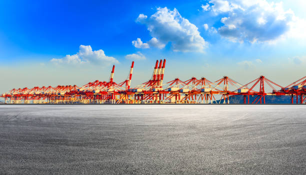 Empty race track and industrial container freight port in Shanghai.
