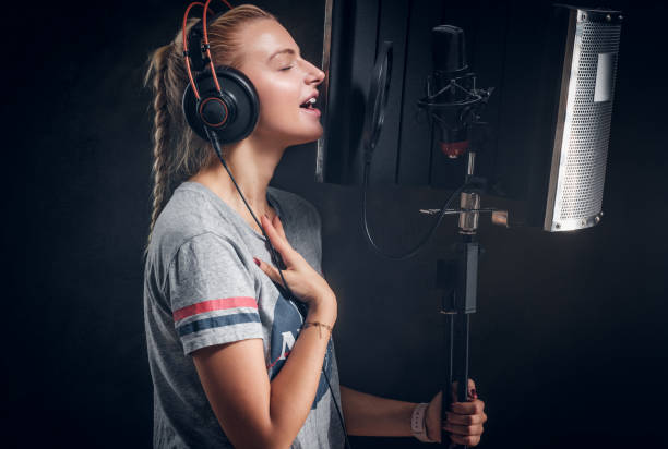 istock Portrait of nice singer at studio 1209249255