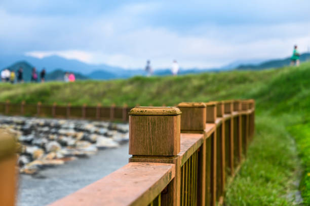 background, baluster, banister, beautiful, brown, carpentry, column, construction, deck, decorative, diagonal, element, environment, fence, green, handrail, hiking, landscape, natural, nature, old, outdoor, outdoors, park, path, planks, porch, railing, scenery, structure, style, summer, travel, walk, wood, wooden