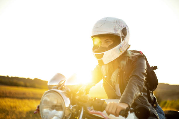 istock Woman biker on a trip 1209250640