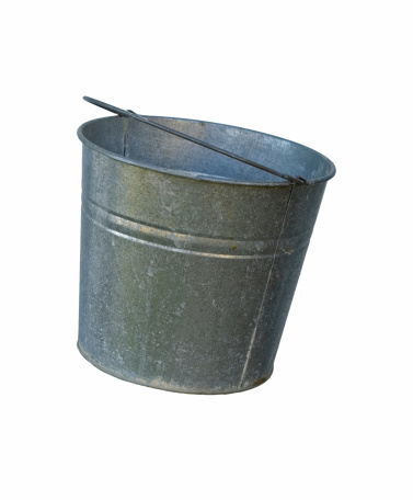 An isolated galvanized metal bucket.