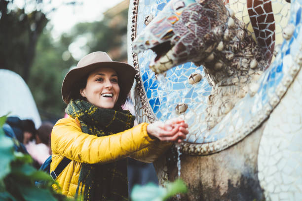 istock Tourist woman visiting Barcelona 1209252652