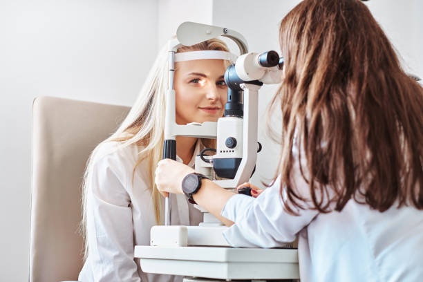 istock Woman Is checking her sight at optician cabinet 1209252672