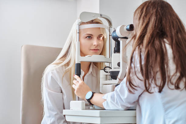 istock Woman Is checking her sight at optician cabinet 1209252899