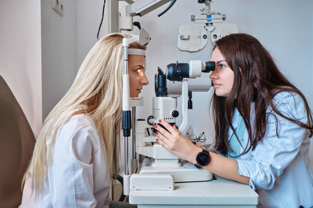 istock Woman Is checking her sight at optician cabinet 1209252969