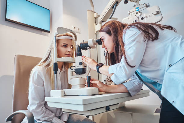 istock Woman Is checking her sight at optician cabinet 1209253136