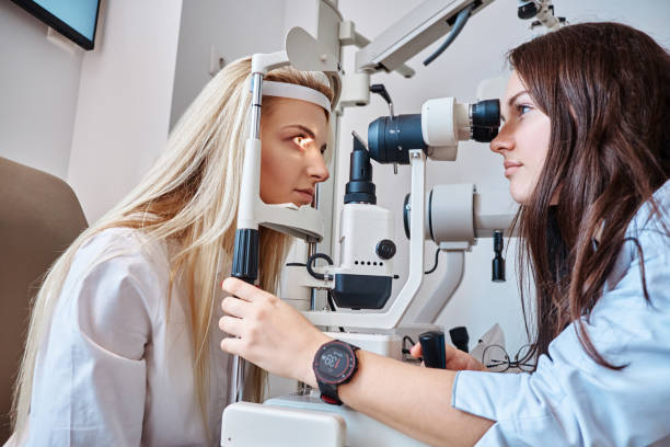 istock Woman Is checking her sight at optician cabinet 1209253313