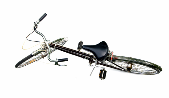 Looking down on a bike with a white background with copy space.