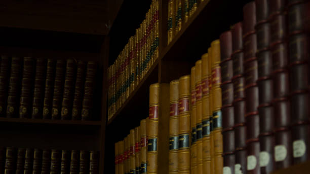 istock Old books row background. Old fashioned books closeup. 1209254593