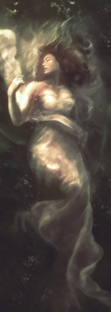 istock beautiful woman in long white dress underwater 1209260110