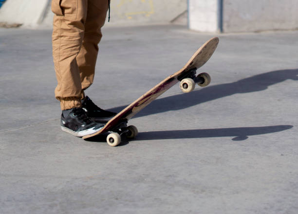 istock skateboard day on obstacle course with brown pants 1209263618