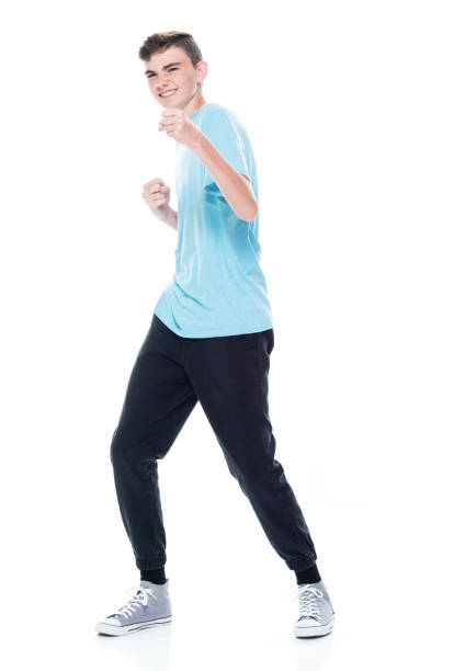 istock Caucasian boys standing in front of white background 1209263655