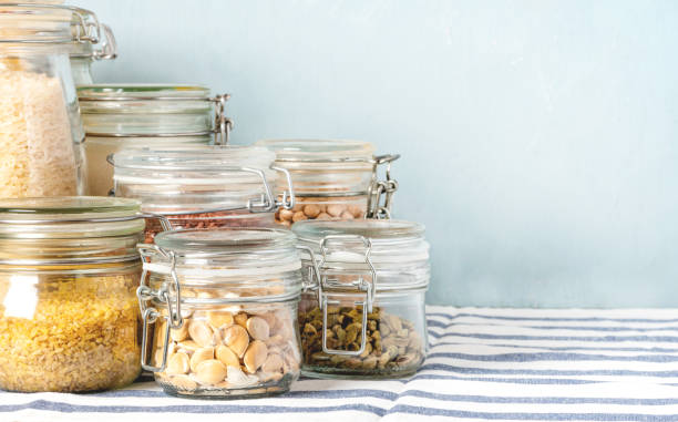 istock Various raw cereals and beans in glass jars 1209263687