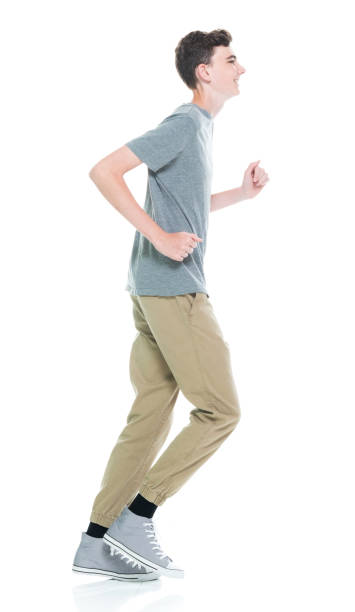 istock Caucasian young male running in front of white background 1209263796