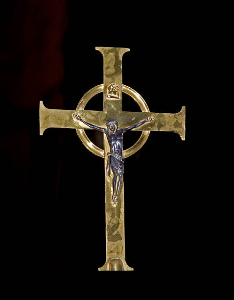 istock Silver Jesus on a golden cross 120926942