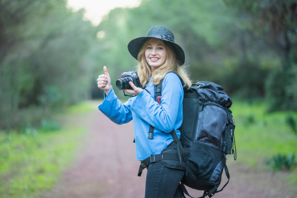 istock tourist woman making a check mark 1209269702
