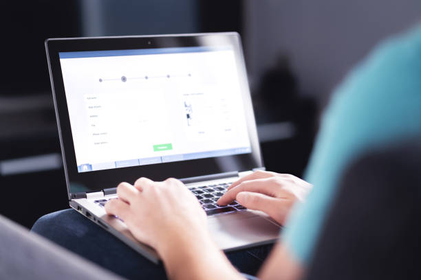 Personal information to shop online. Filling electronic form on internet with laptop. Digital customer info on website. Man buying a service or ordering a product Personal information to shop online. Filling electronic form on internet with laptop. Digital customer info on website. Man buying a service or ordering a product. Web data protection in e commerce. registration form stock pictures, royalty-free photos & images