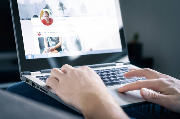 istock Social media website. Networking site in laptop screen with profile photo, shared posts and status updates. Personal branding concept. Digital communication portal and online page. 1209272571