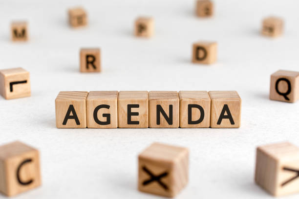istock Agenda - words from wooden blocks with letters 1209272711