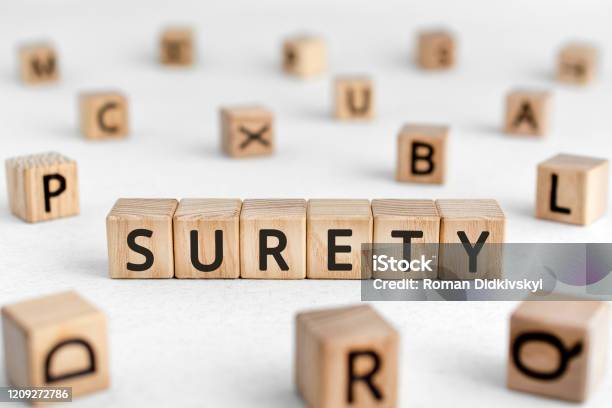 Surety Words From Wooden Blocks With Letters Stock Photo - Download Image Now - Bonding, Bail, Contract