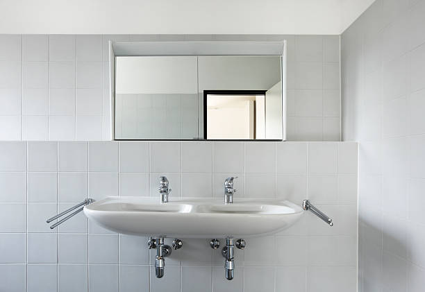 istock view of bathroom sink and mirror, tiled wall 120927711