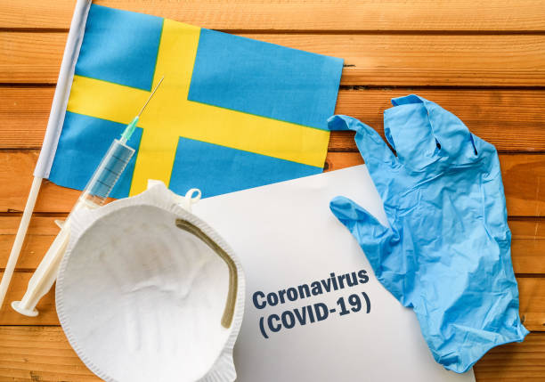Coronavirus in Sweden Flag of Sweden,, vaccine, face mask for virus, glove and paper sheet with words Coronavirus COVID-19 antibiotic resistant photos stock pictures, royalty-free photos & images