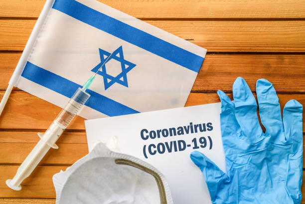 Coronavirus in Israel. Flag of Israel, vaccine, face mask for virus, glove and paper sheet with words Coronavirus COVID-19 antibiotic resistant photos stock pictures, royalty-free photos & images
