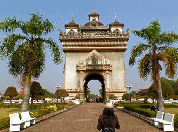 Female Traveler Heading to the Gate of Triumph or Patuxai in the Citycentre of Vientiane, Laos, (Self Portrait)