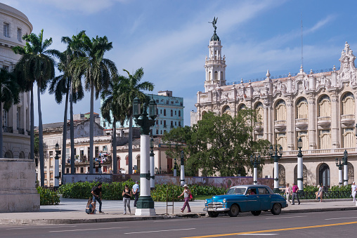 Havana, Cuba - January 17, 2016: Gardens and promenade of Marti and National Theater of Cuba next to the Cuban Capitol