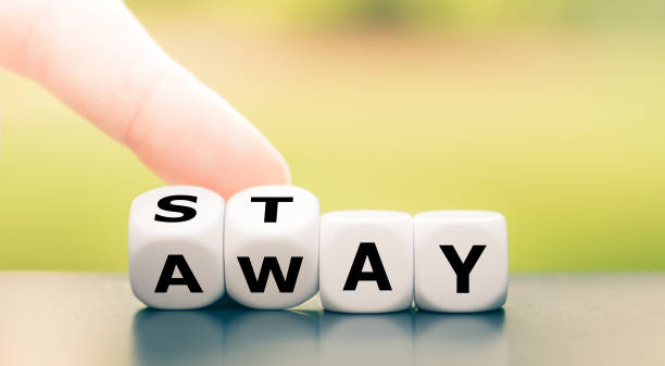 istock Hand turns dice and changes the word 