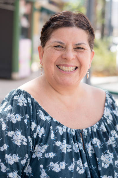 istock Smiling mature woman looking at camera 1209282702