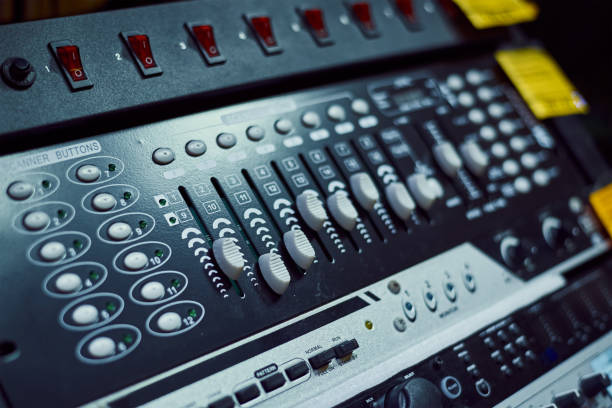 istock Audio music mixer console on a black background. Sound studio mixing desk 1209285703