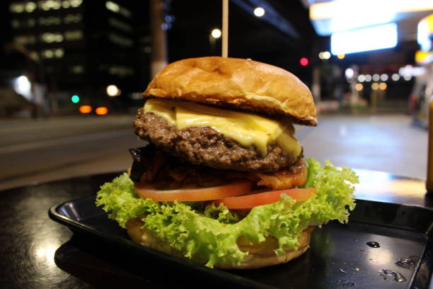 istock homemade hamburger sandwich with lettuce tomato and bacon 1209286876