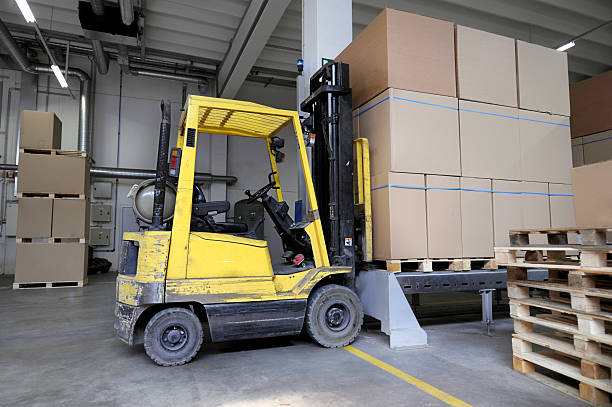 istock forklift with carton boxes in factory 120928706