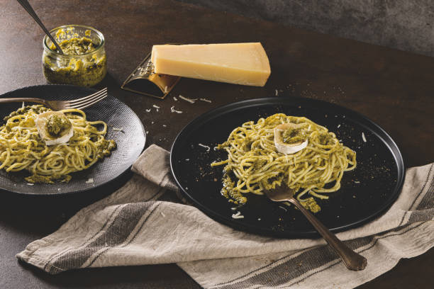 istock Fresh spaghetti with basil pesto and cheese 1209292458