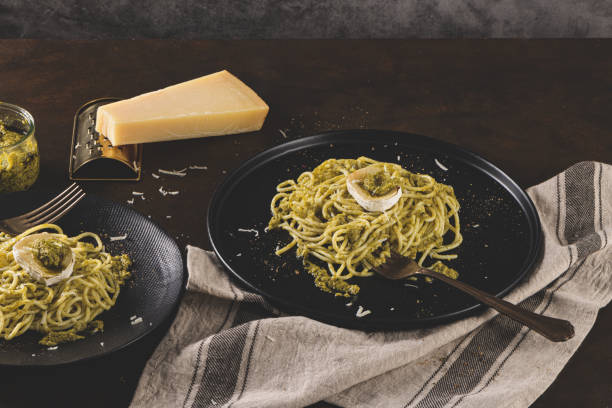 istock Fresh spaghetti with basil pesto and cheese 1209292508