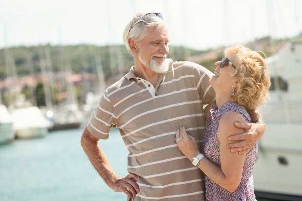 istock Mature couple having fun on a sunny day in marina 1209296930