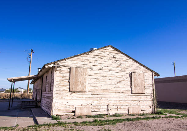 istock Abandoned Home With Boarded Up Windows 1209299389
