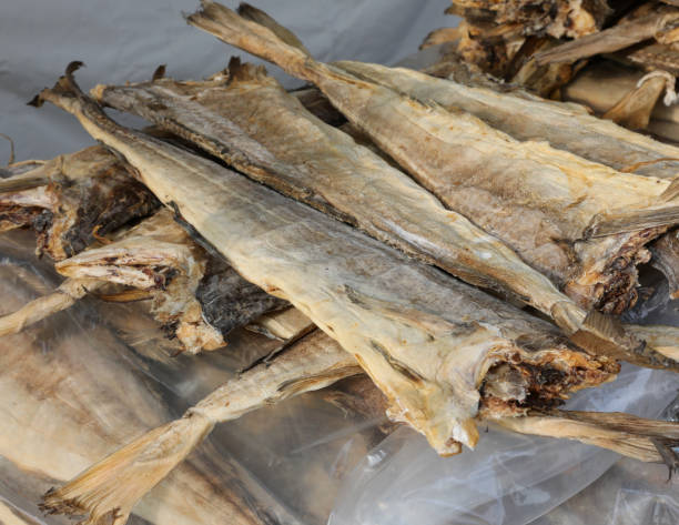 istock dried cod type fish on sale in the stall of fish 1209301509