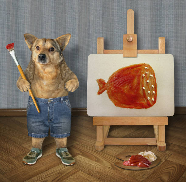 istock Dog artist painting on canvas 2 1209303092