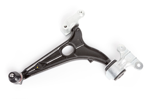 New front half-axle suspension wishbone with ball joint, for replacement and mechanical repair on motor vehicle. New insulated spare part on a white background